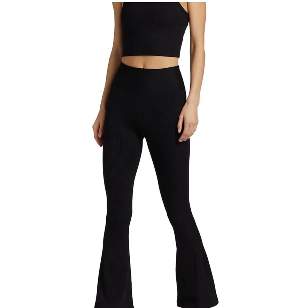 Naked Wardrobe rubbed flare leggings in black. Size S. NWOT